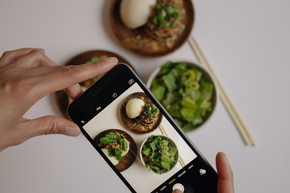 Lightspeed Mobile App Development for Restaurants 24 lightspeed mobile app development person taking picture of vegetables