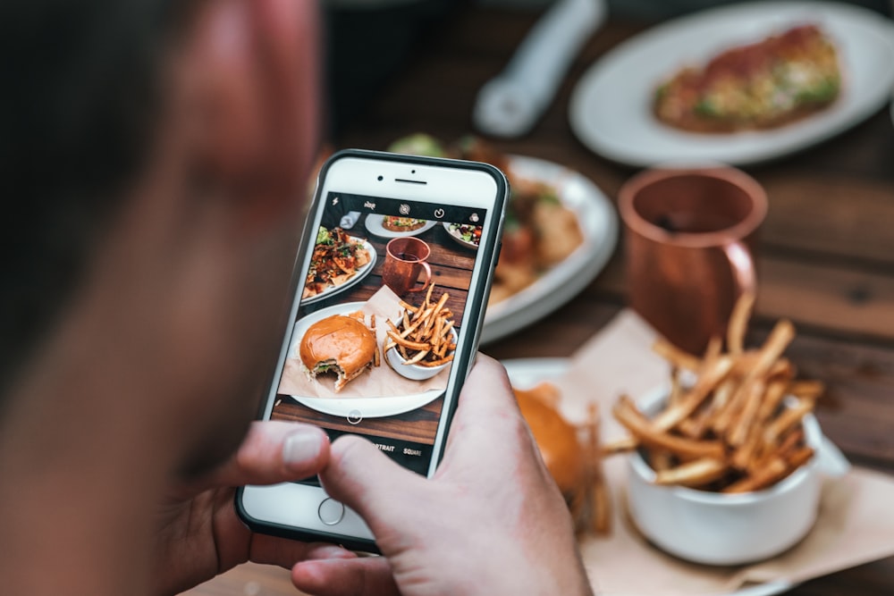 SpotOn Mobile App Development for Restaurants 24 spoton mobile app development silver-colored iPhone 6 with black case