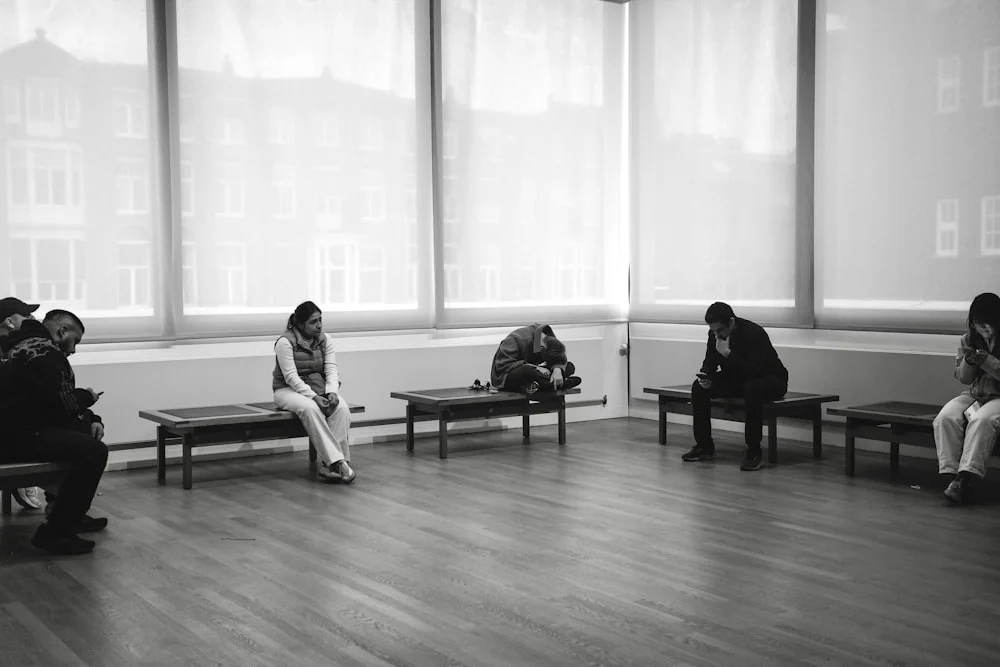 clinical trial local seo People sitting on benches in a room