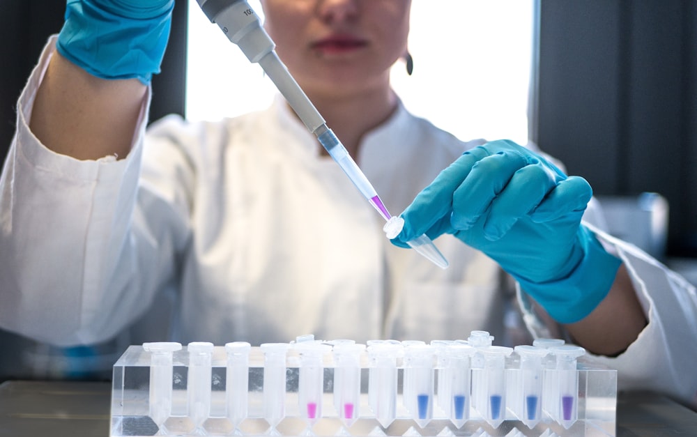 Clinical Trial Content Marketing From Mindshare Consulting 3 clinical trial content marketing scientist using pipette with test tubes in lab