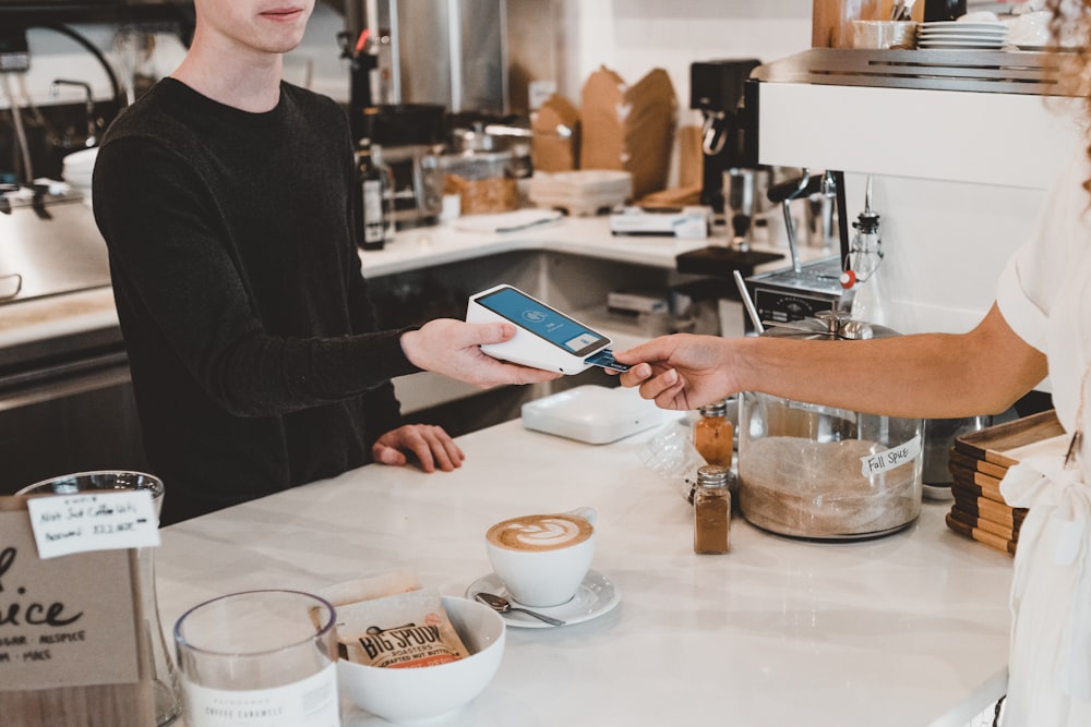 PAR Brink API and Custom Integrations for Restaurants 27 man paying using credit card