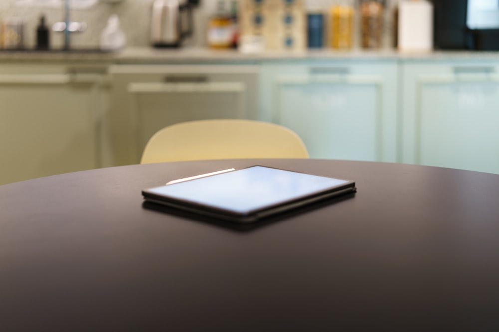SpotOn API and Custom Integrations for Restaurants 25 A table with a cell phone on top of it