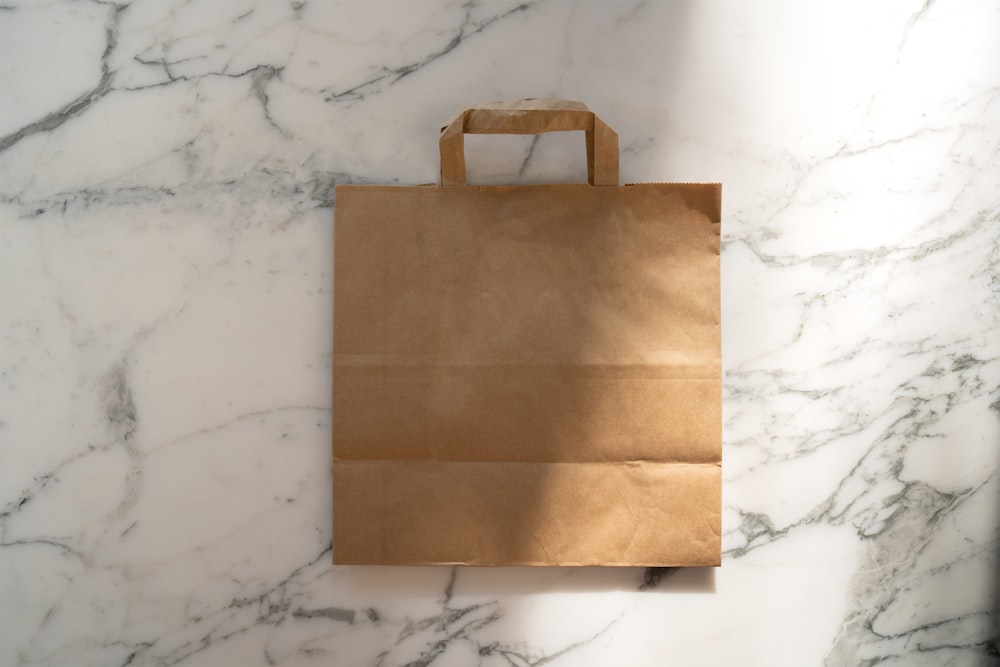 Clover Online Ordering Setup for Restaurants 24 clover online ordering a brown paper bag sitting on top of a marble counter