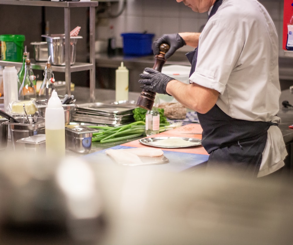 TouchBistro API and Custom Integrations for Restaurants 26 man putting herb on food