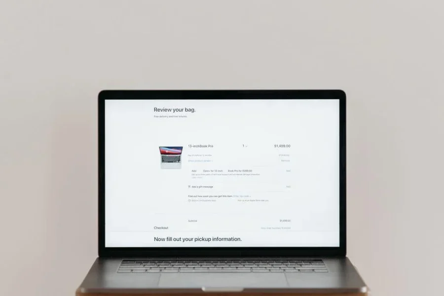 Online shopping cart shown on a laptop, illustrating ecommerce vs lead generation website design